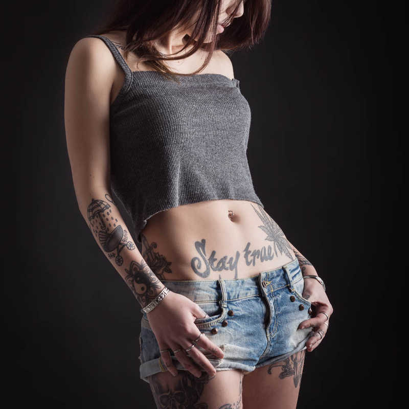 Woman-in-tank-top-with-tattoos